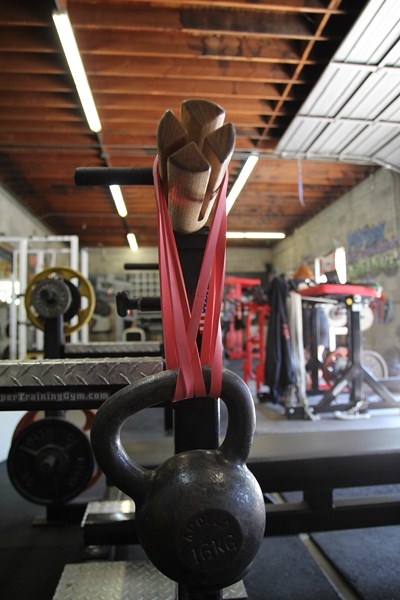 Kettlebells attached to Bamboo